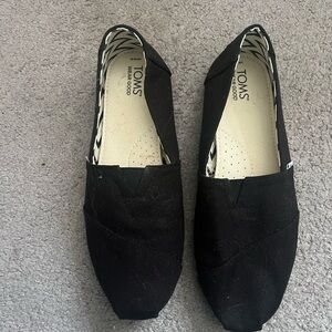 TOMS Classic Black Canvas Slip-Ons